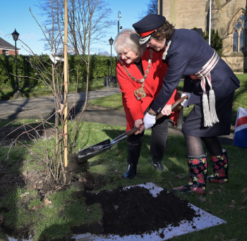 Linda and Diane planting the tree at Bolton Parish Council