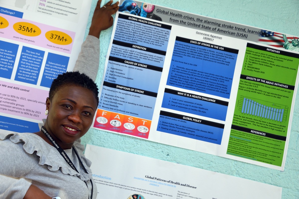 Health Student with Poster