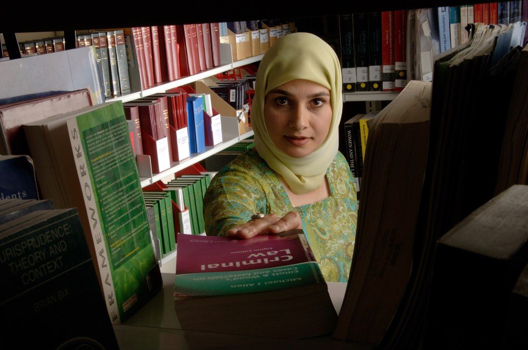 Student in the law library at the University of Bolton