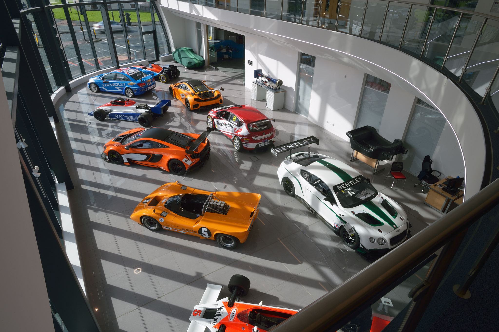 Racecars on display in the Atrium at the National Centre for Motorsport Engineering, University of Bolton