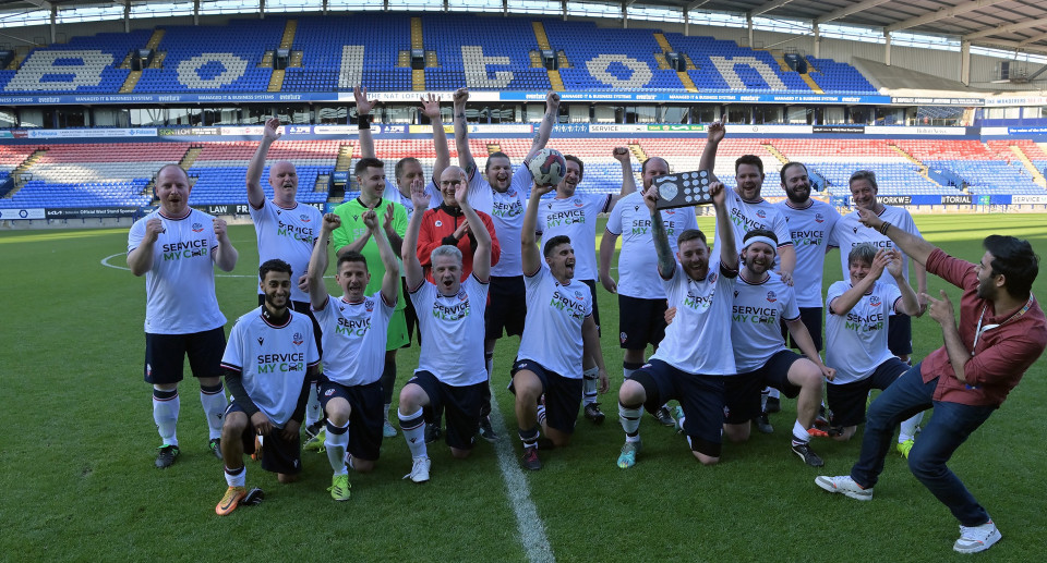 Staff footballers victorious in match against students at home of Bolton Wanderers