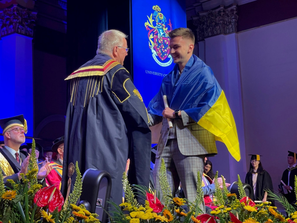 Ukrainian student celebrates graduating from University of Bolton as parents look proudly on