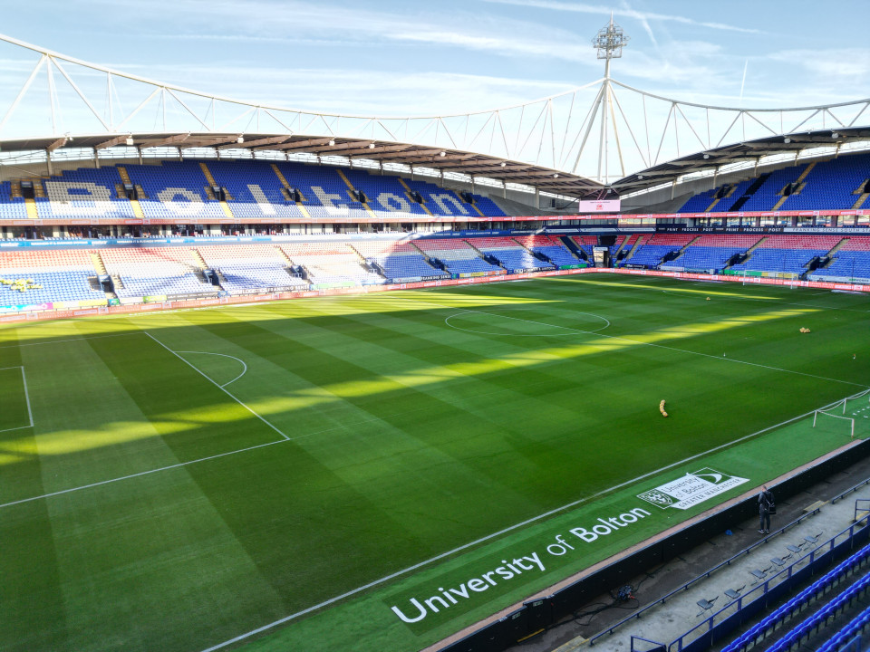 University of Bolton logos on hallowed turf as pitch sponsor for Bolton Wanderers Football Club