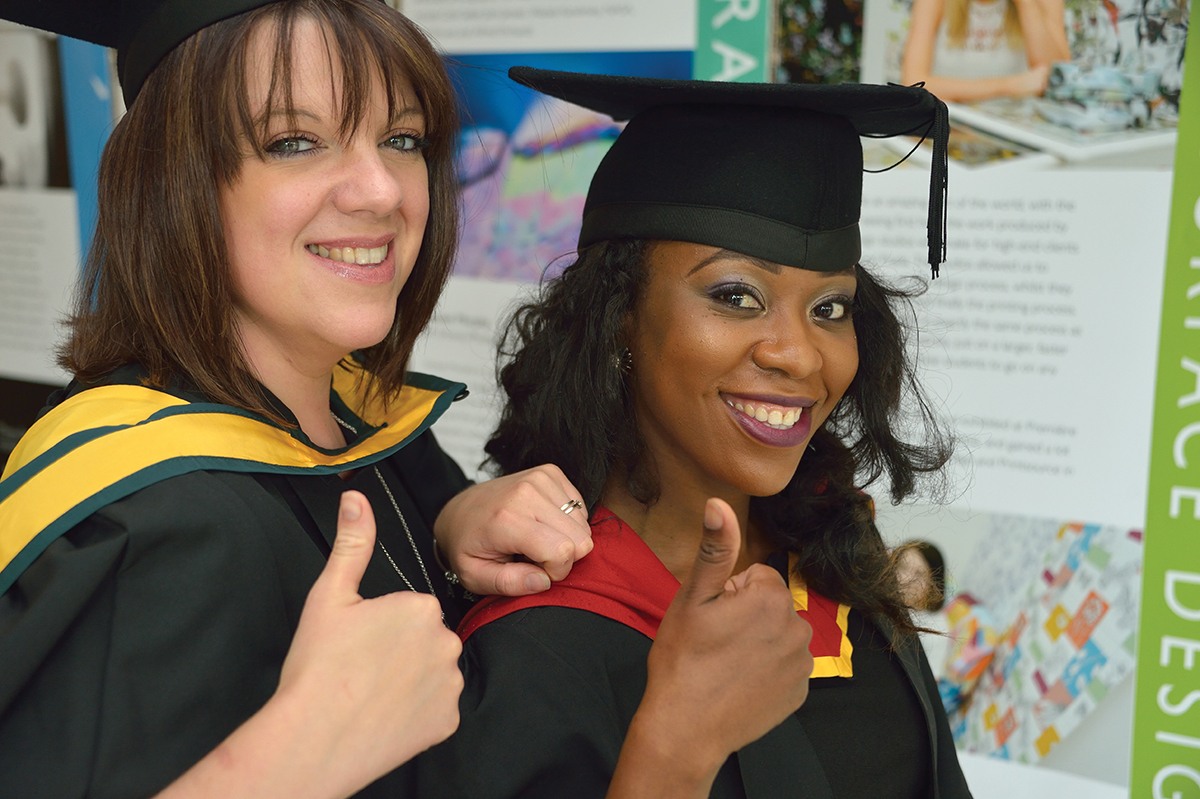 graduation thumbs up